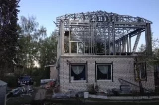 Фото Строительство мансардных этажей в жилых зданиях